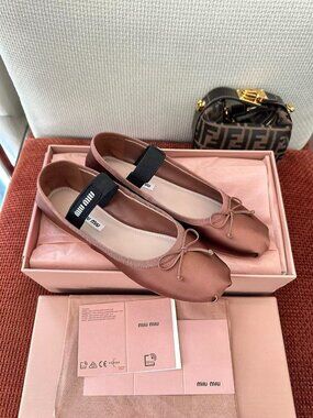 Miu Miu Mary Jane flats with bows